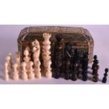 AN EARLY 19TH CENTURY EUROPEAN CARVED BONE CHESS SET with one side stained. Queen 3.5ins high.