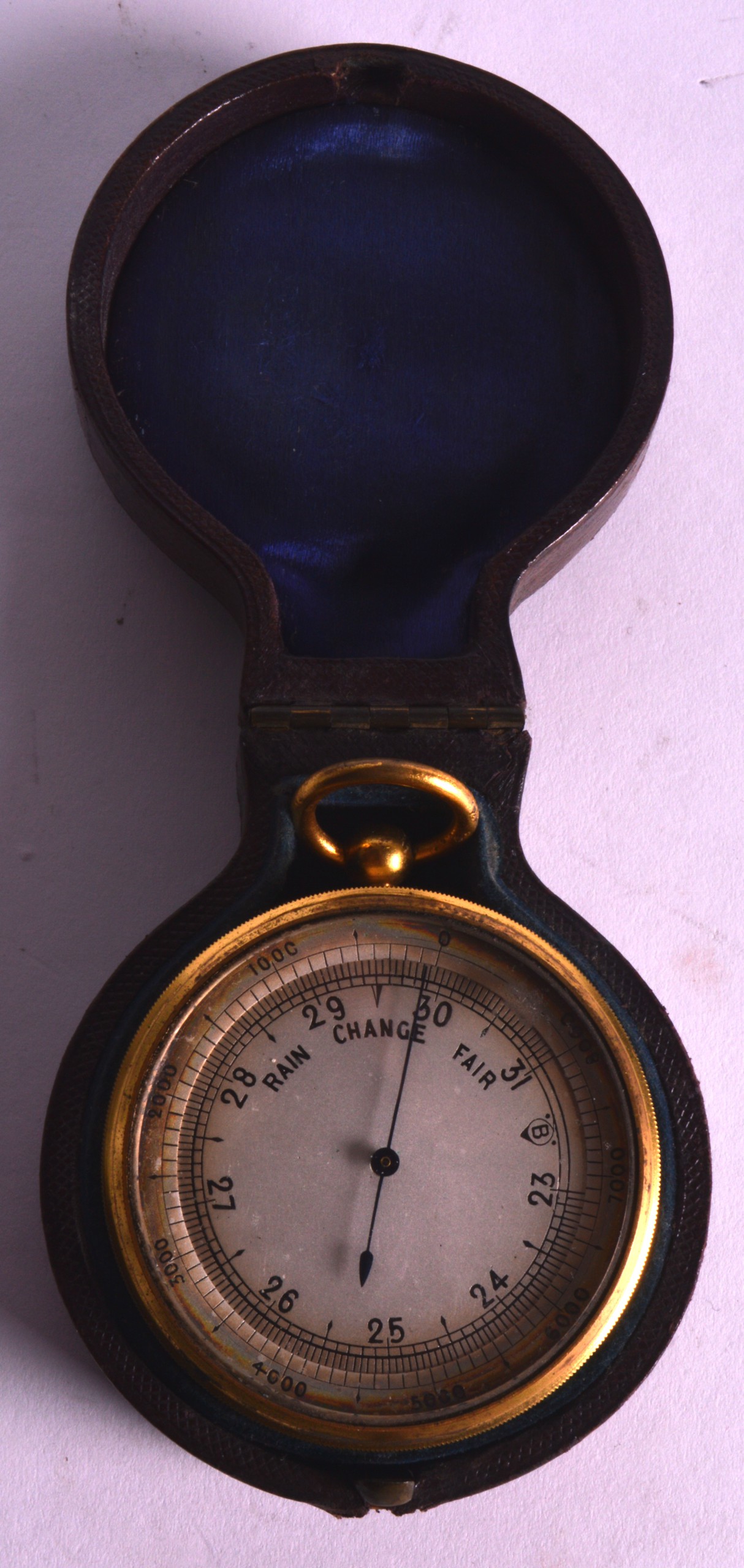 A 19TH CENTURY POCKET BAROMETER AND THERMOMETER. 2.25ins diameter.