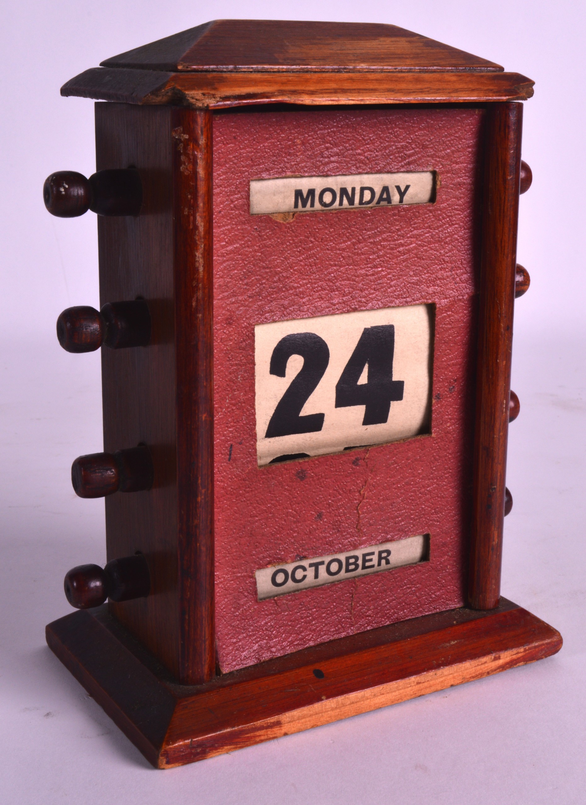 A 1930S OAK DESK CALENDAR. 7Ins high.