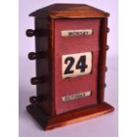 A 1930S OAK DESK CALENDAR. 7Ins high.