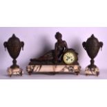A 19TH CENTURY FRENCH PATINATED SPELTER FIGURAL CLOCK SET modelled as a reclining female, with