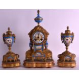 A LATE 19TH CENTURY FRENCH GILT CLOCK GARNITURE inset with blue Serves type panels of birds,