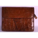 A VINTAGE CROCODILE SKIN LADIES PURSE/BAG. 12Ins wide.