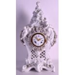 A GOOD 19TH CENTURY MEISSEN BLANC DE CHINE MANTEL CLOCK modelled with a female beside a lamb, the