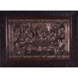 A LARGE 19TH CENTURY FRAMED WHITE METAL EUROPEAN PANEL depicting a scene of the last supper.