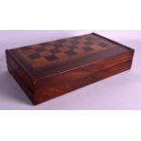 A VICTORIAN WALNUT AND ROSEWOOD GAMING BOARD for chess and back gammon. 1Ft 8ins wide extended.