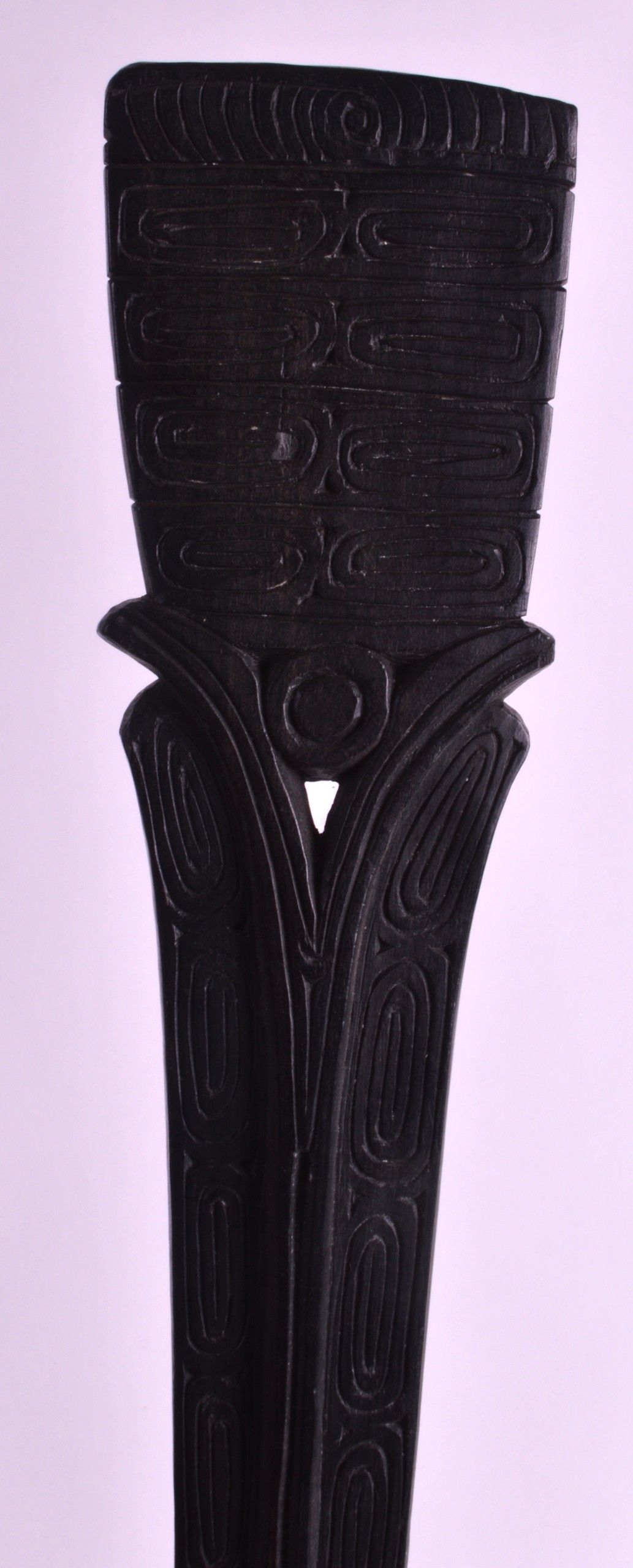 AN EARLY 20TH CENTURY CARVED EBONISED WOOD SPATULA probably Massim Culture, New Guinea, the top - Image 2 of 2