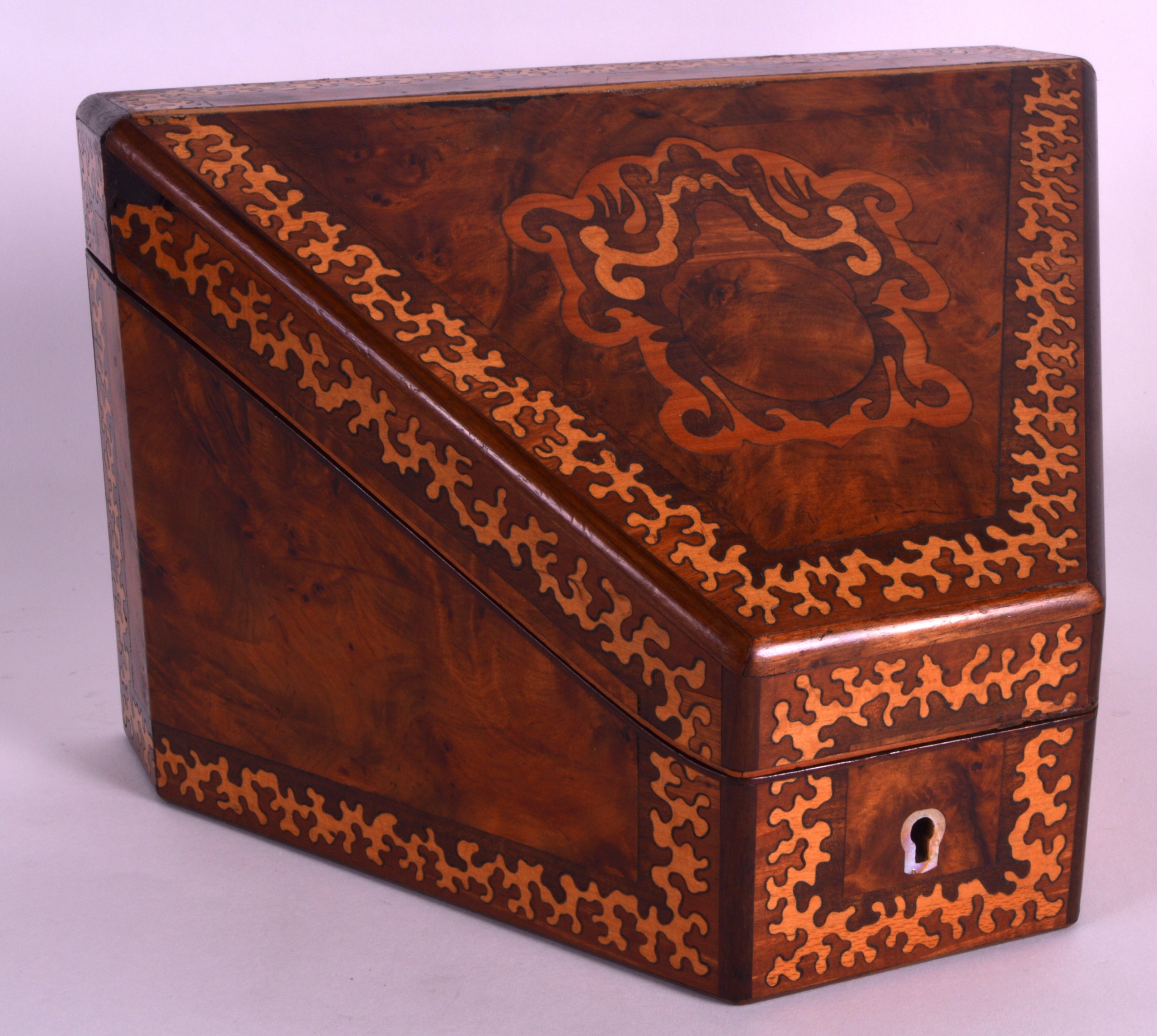 A VICTORIAN WALNUT STATIONARY BOX with seaweed inlaid decoration, the top opening to reveal a fitted