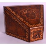 A VICTORIAN WALNUT STATIONARY BOX with seaweed inlaid decoration, the top opening to reveal a fitted