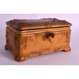 A FINE ART NOUVEAU GILT BRONZE JEWELLERY CASKET the top signed, decorated in relief with flowers and