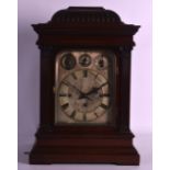 A GOOD VICTORIAN MAHOGANY BRACKET CLOCK with Westminster chiming movement, the main dial flanked