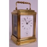 AN EARLY 20TH CENTURY FRENCH BRASS CARRIAGE CLOCK by Purvis & Bishop, the white enamel dial with