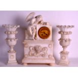 A 19TH CENTURY FRENCH WHITE MARBLE CLOCK GARNITURE modelled as a cupid with his finger raised, the