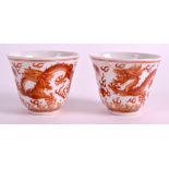 A PAIR OF CHINESE IRON RED PORCELAIN TEABOWLS Tongzhi mark and possibly of the period, decorated