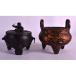 A CHINESE QING DYNASTY TWIN HANDLED BRONZE CENSER bearing Xuande marks to base, together with