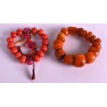 A GOOD EARLY 20TH CENTURY CHINESE CARVED AMBER BRACELET comprising of several thick beads,