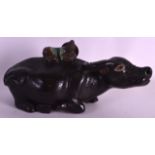 A MID 19TH CENTURY CHINESE STONEWARE MODEL OF A BUFFALO modelled with a young boy upon its back. 1Ft