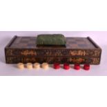 AN EARLY 19TH CENTURY CHINESE EXPORT GAMING BOX containing well carved ivory counters. Box 3ft