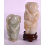 A GOOD 19TH CENTURY CHINESE CARVED PALE JADE FIGURE OF A BOY together with another similar jade