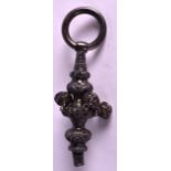 A VICTORIAN SILVER CHILDS RATTLE decorated in relief with flowers. 5.25ins long.