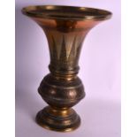 A 19TH CENTURY INDIAN GU FORM BEAKER VASE incised with motifs and flowers. 1Ft 6ins high.