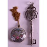 A STERLING SILVER KEY together with a silver mounted enamel locket on chain. (2)