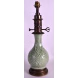 AN EARLY 20TH CENTURY CHINESE CELADON VASE converted to a lamp. Vase 9.5ins high.