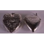 A SILVER HEART SHAPED VESTA CASE together with another similar. (2)
