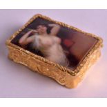 A NOVELTY GOLD PLATED SNUFF BOX decorated with a pretty female. 2.25ins wide.