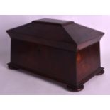 A MID 19TH CENTURY VICTORIAN FLAME MAHOGANY TEA CADDY of large proportions, the top rising to reveal