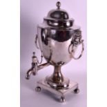 A MID 19TH CENTURY SILVER PLATED TWIN HANDLED SAMOVAR with lion mask head handles. 13.75ins high.