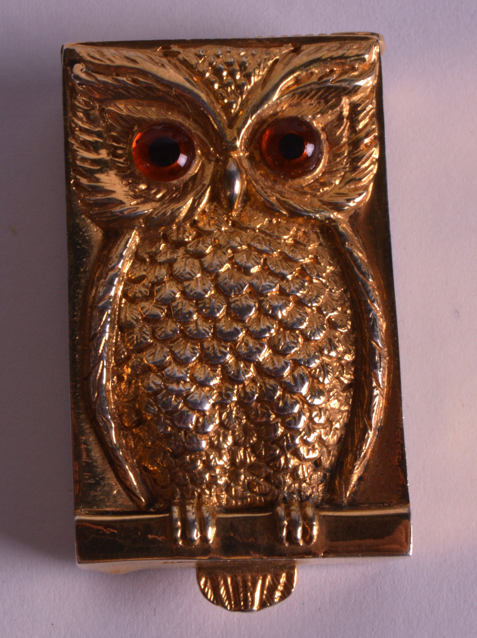 A SILVER AND GOLD PLATED NOVELTY OWL VESTA CASE. 2.25ins x 1.25ins.