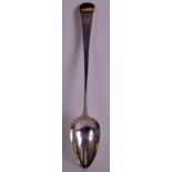 A GEORGE III SILVER STUFFING SPOON. London 1802. 11ins long.