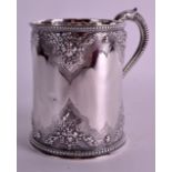 A LOVELY VICTORIAN SILVER CHRISTENING MUG decorated with acanthus and flowers in relief, together