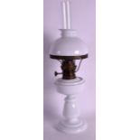 A VICTORIAN OPALINE WHITE GLASS OIL LAMP. 1Ft 5ins high.