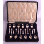 A CASED SET OF TWELVE STERLING SILVER TEASPOONS. Stamped Sterling.