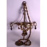 AN ART NOUVEAU BRONZE CHANDELIER of scrolling form. 2Ft high.