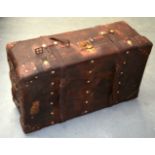 A GOOD LARGE ANTIQUE GENTLEMANS LEATHER SUITCASE with brass stud work decoration. 1Ft 10ins wide.
