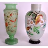 A VICTORIAN ENAMELLED OPALINE GLASS VASE together with another similar vase. 9.5ins high. (2)