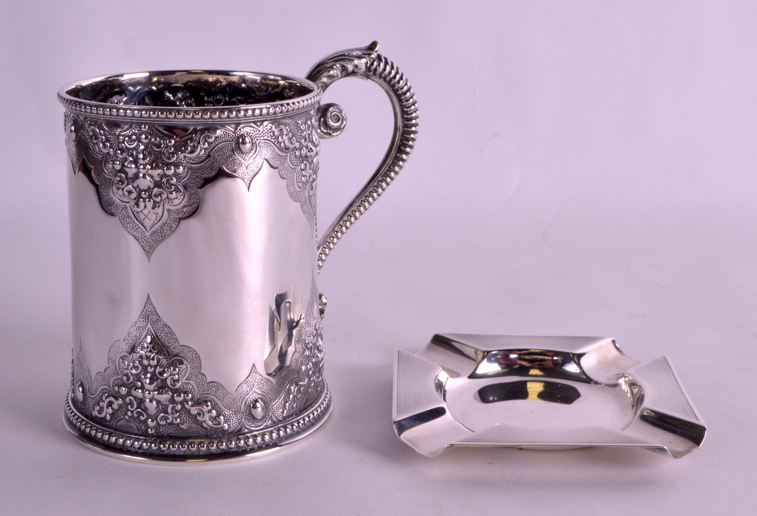 A LOVELY VICTORIAN SILVER CHRISTENING MUG decorated with acanthus and flowers in relief, together - Image 2 of 2