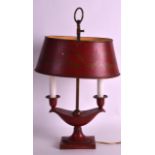 AN ANTIQUE ENGLISH TOLEWARE TWIN BRANCH LAMP with matching shade. 1Ft 5ins high.