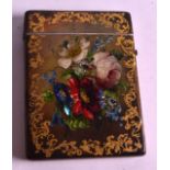 A VICTORIAN PAINTED PAPIER MACHE CARD CASE AND COVER decorated with flowers. 3Ins x 4.25ins.