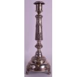 AN EARLY 20TH CENTURY RUSSIAN SILVER CANDLESTICK by J Ehrlich, Kostroma, with domed circular bases