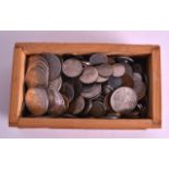 A BOX OF VARIOUS WORLD COINAGE from various Continents. (qty)