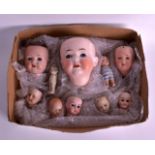 A COLLECTION OF TEN ANTIQUE PORCELAIN DOLLS HEADS of various sizes. (10)