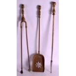 A SET OF THREE ANTIQUE FIRESIDE TOOLS.