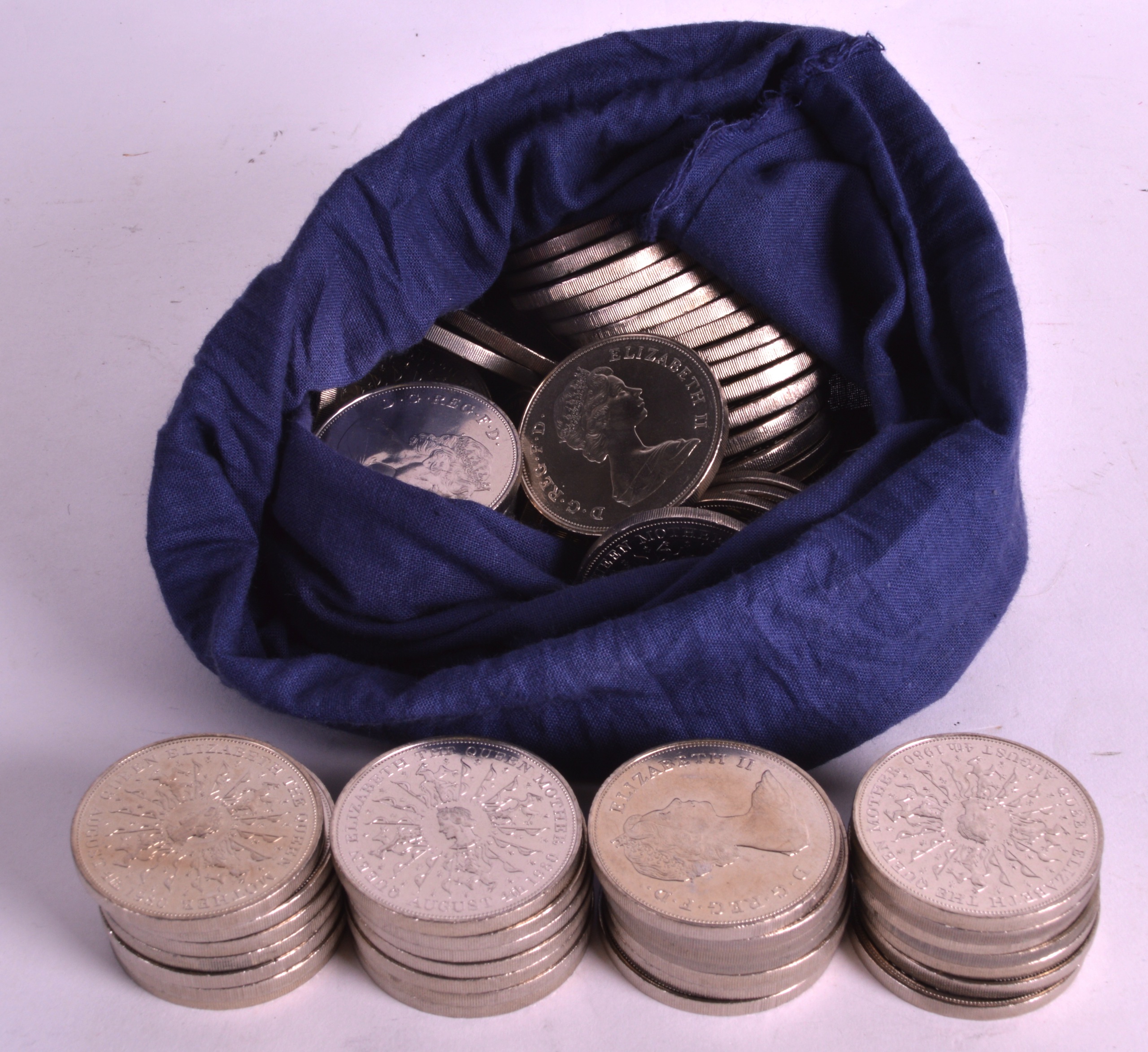 A COLLECTION OF OVER 100 CROWNS 1980 Queen Mother in an opened bank bag. (qty)