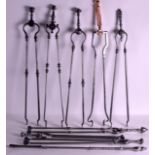 A GROUP OF NINE GEORGE III AND LATER STEEL FIRESIDE TOOLS. (9)