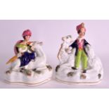A RARE PAIR OF STAFFORDSHIRE FIGURES OF RECUMBANT CAMELS modelled with attendants wearing Eastern