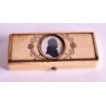 A LATE 18TH/19TH CENTURY CARVED IVORY RECTANGULAR BOX inset with a silhouette of a male, contained